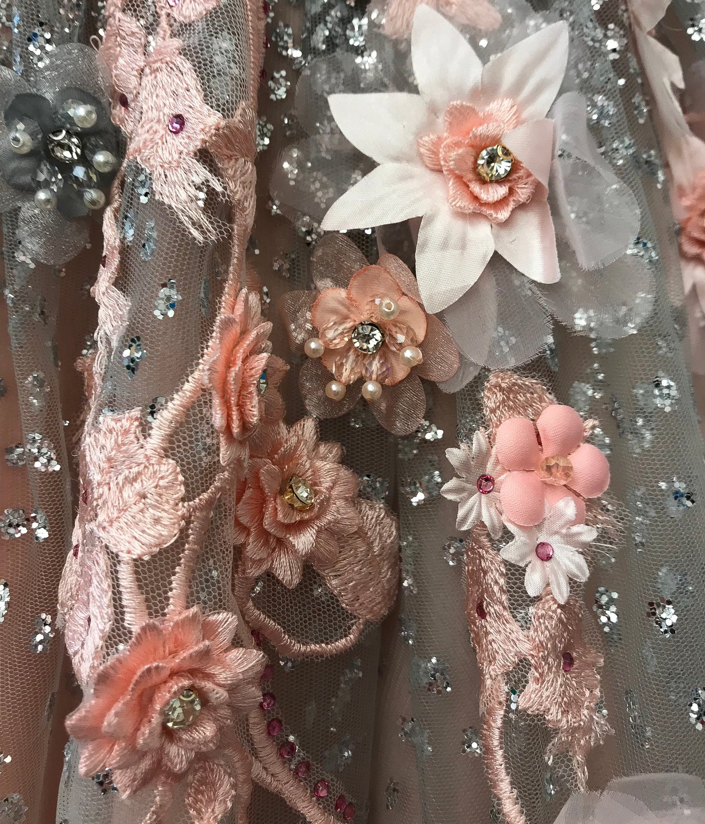 Pink A-Line dress with v-neck, no sleeves and embroidery