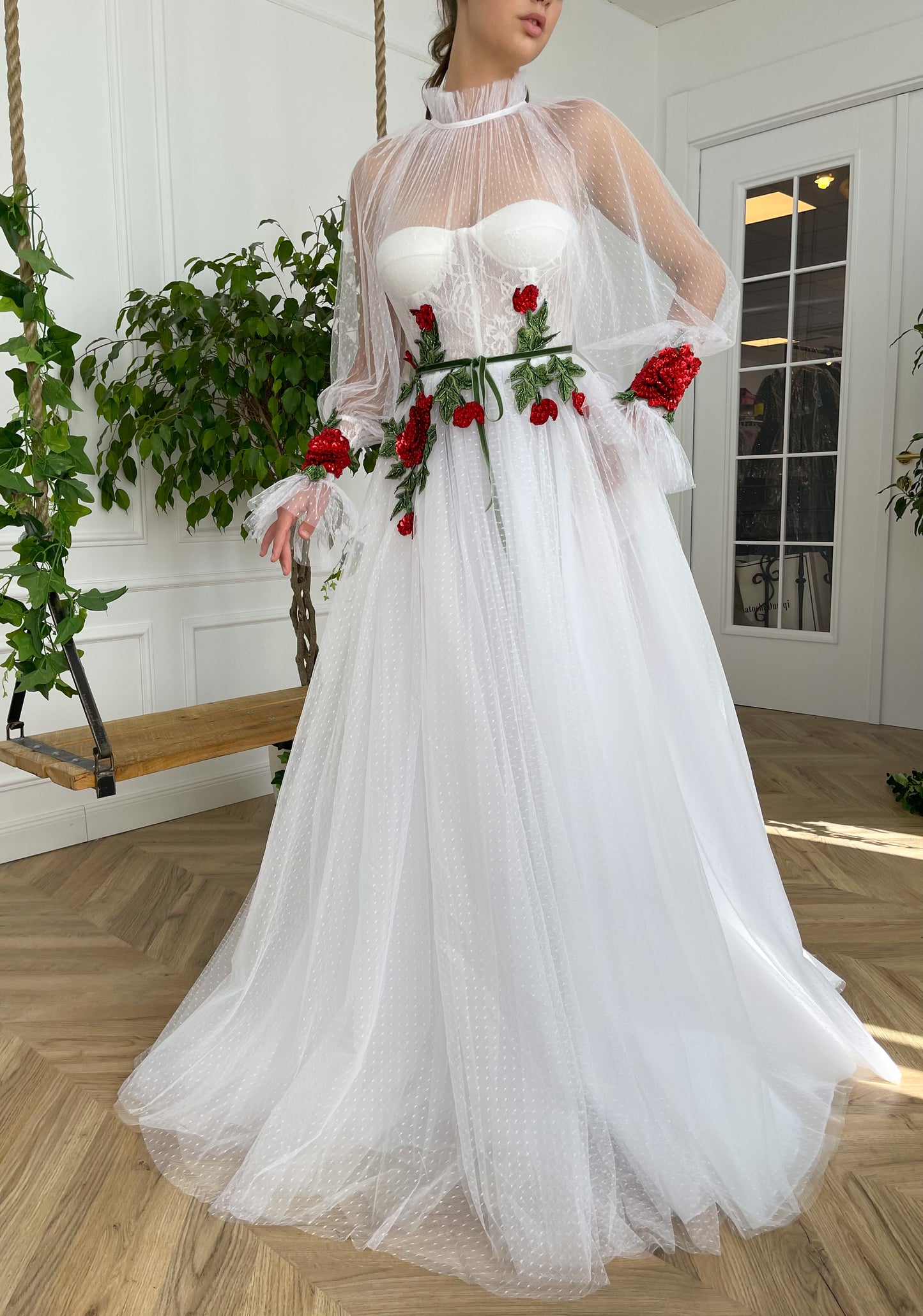 A Line white bridal dress with long sleeves and embroidered flowers