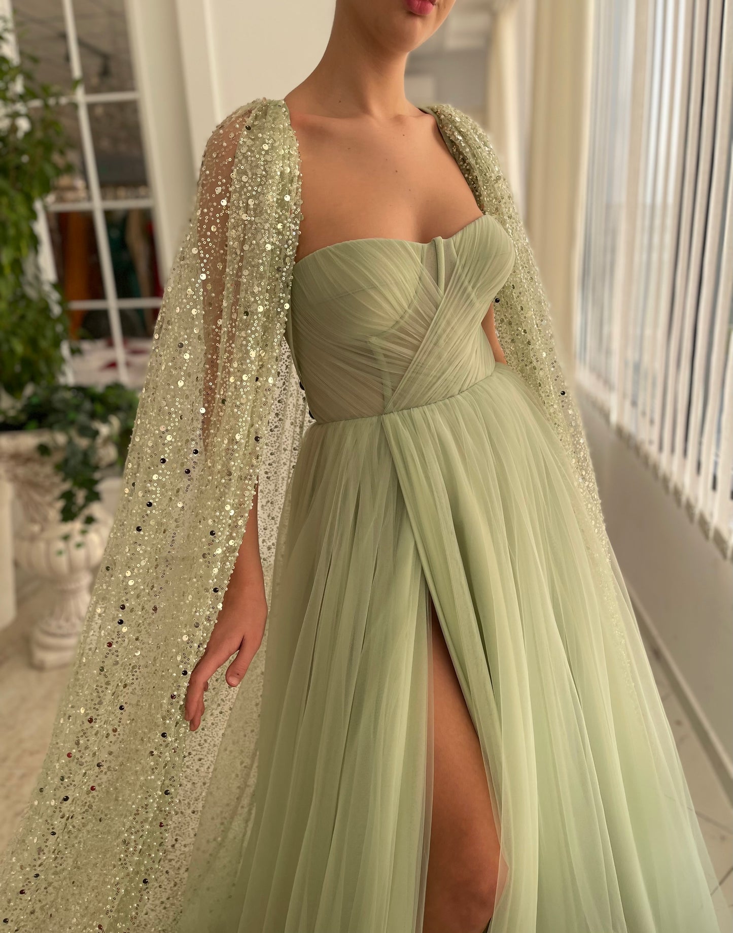 Green A-Line dress with cape sleeves