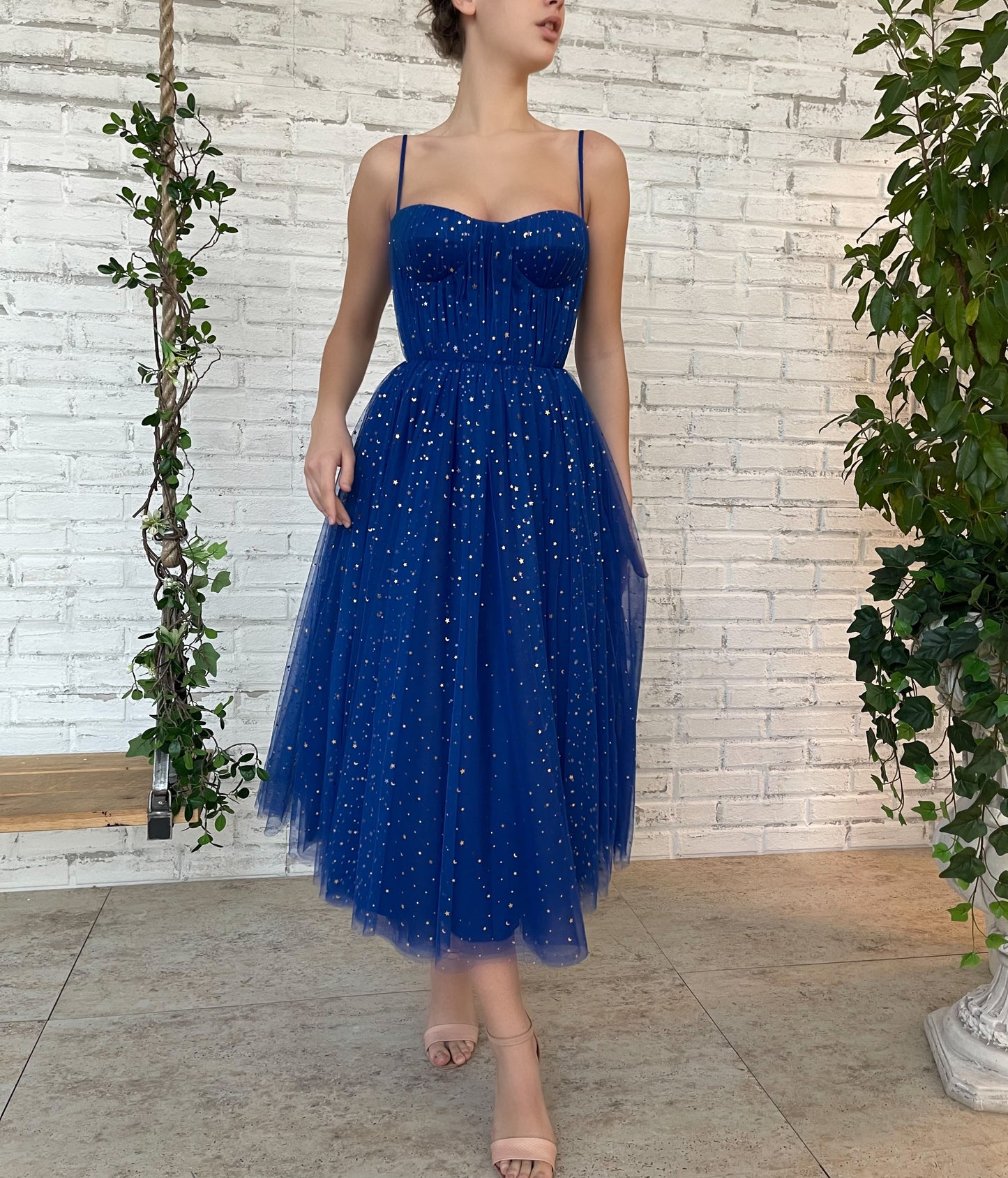 Blue midi dress with spaghetti straps and starry fabric
