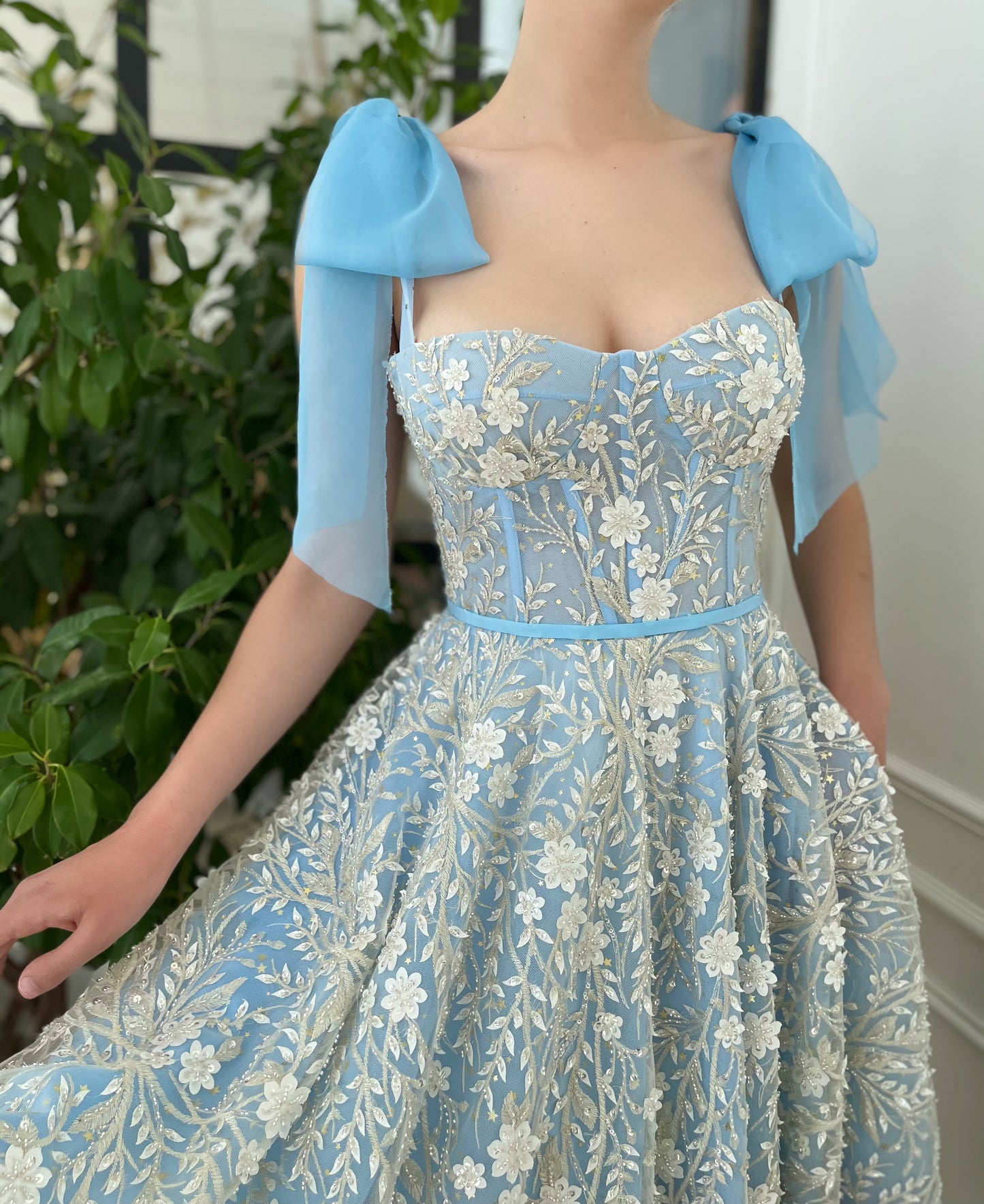 Blue midi dress with bow straps