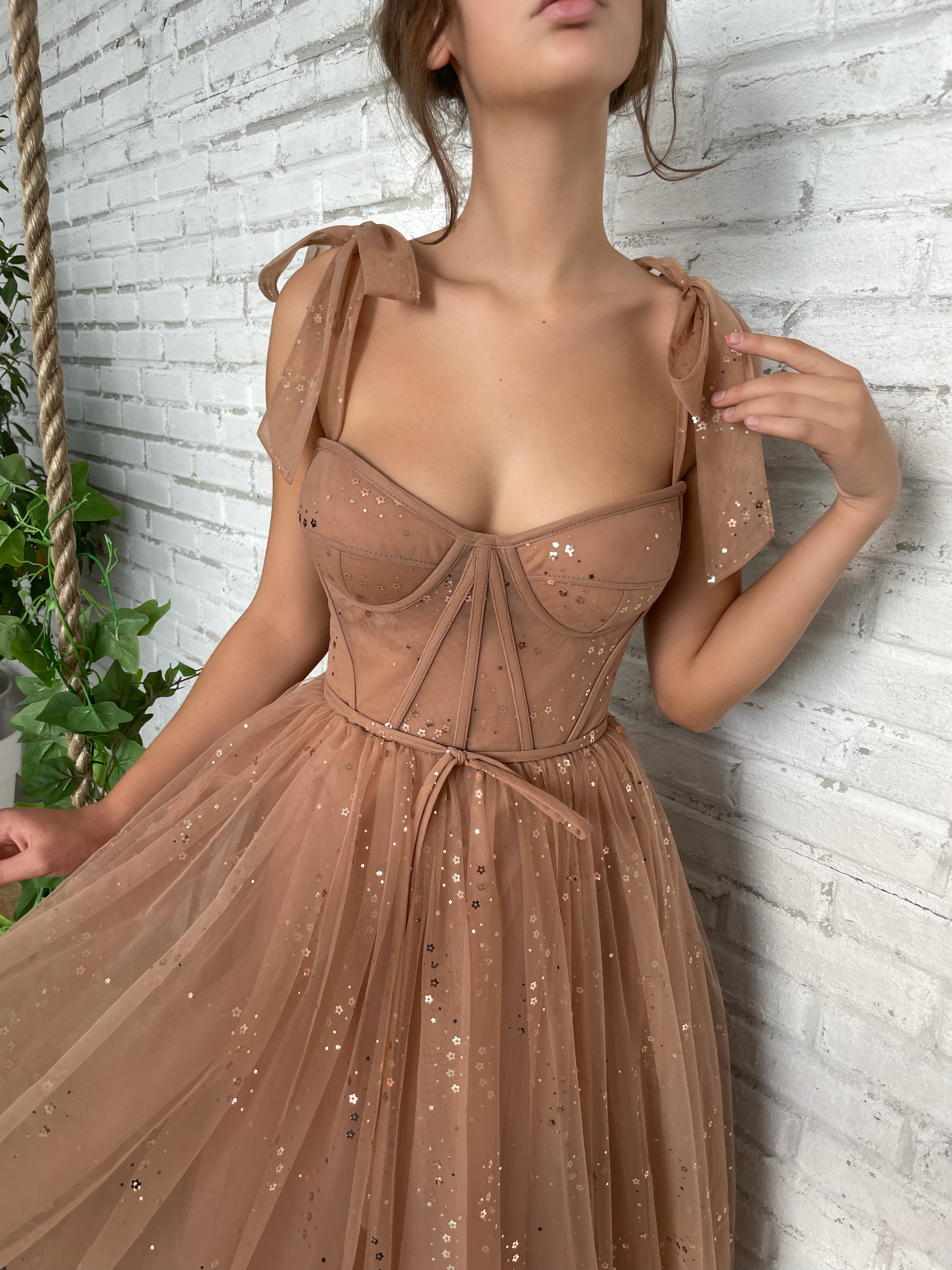 Brown midi dress with bow straps and starry fabric