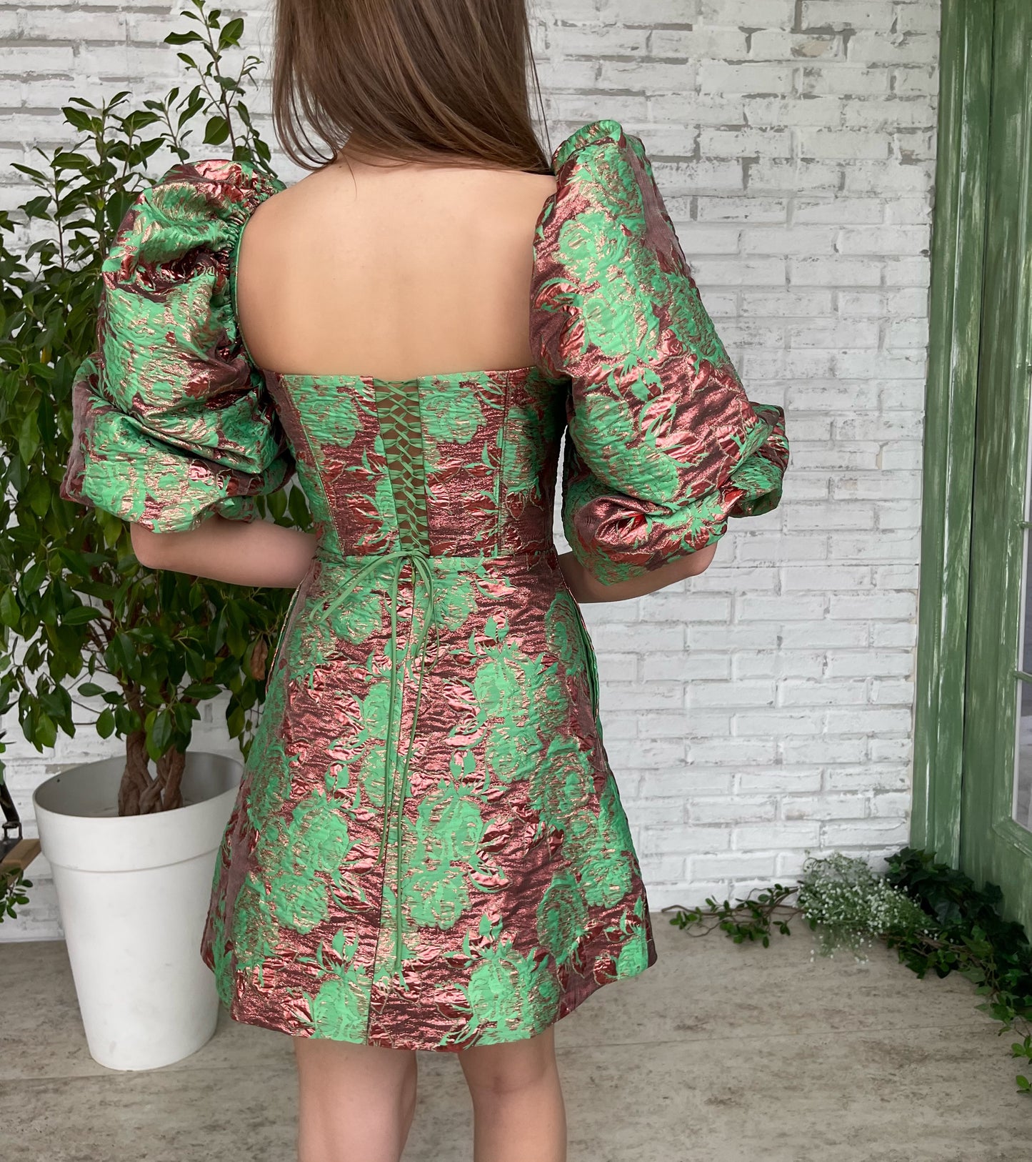 Green mini dress with short puff sleeves
