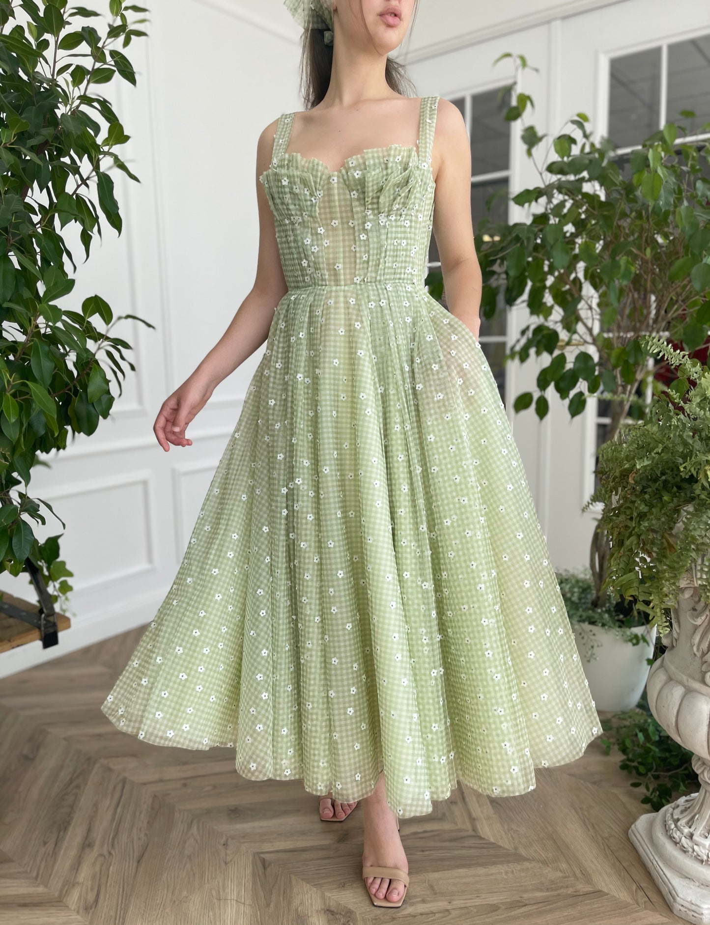 Green midi dress with daisies and straps