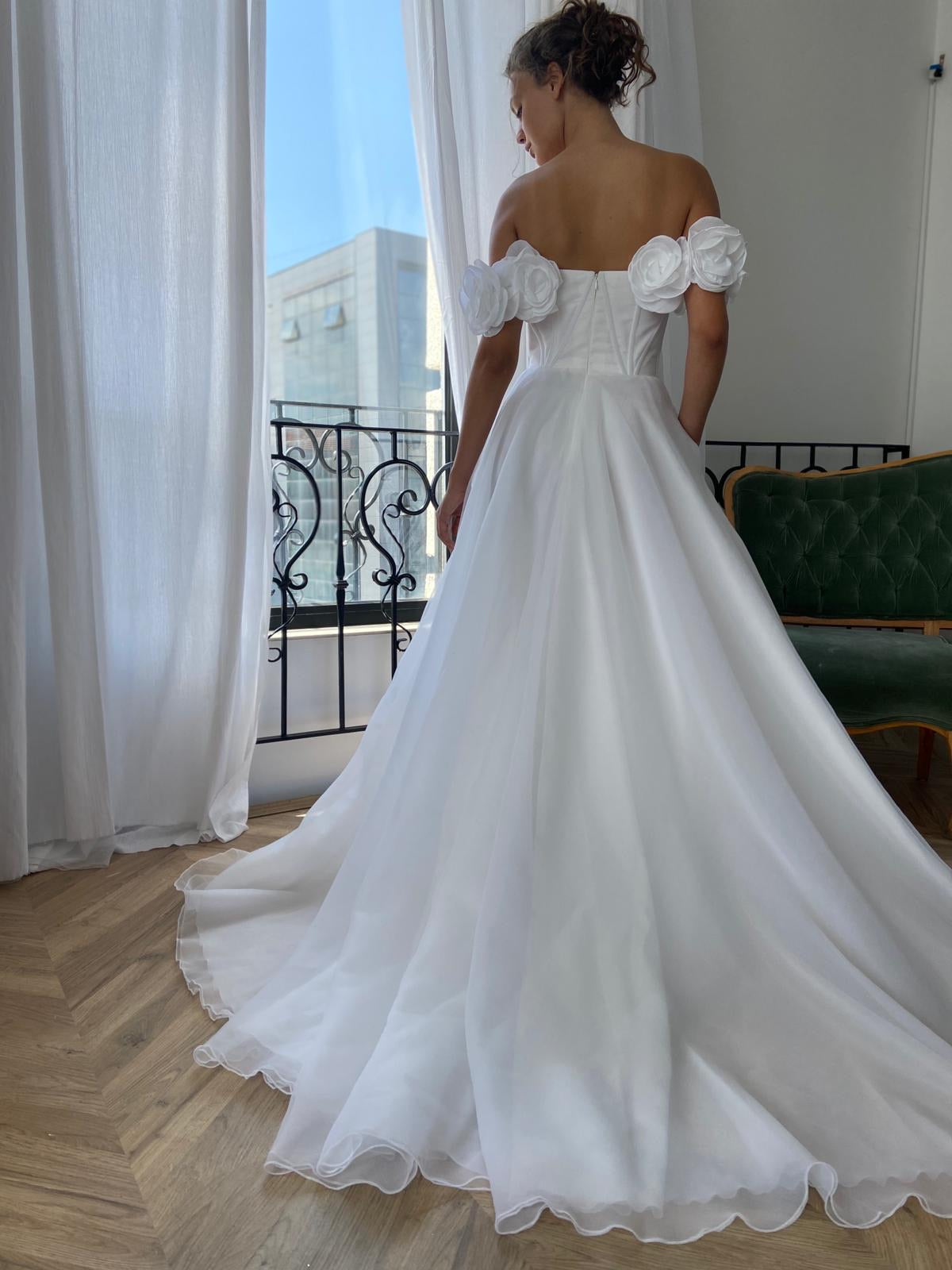 A Line white bridal dress with embroidered flowers and off shoulder sleeves