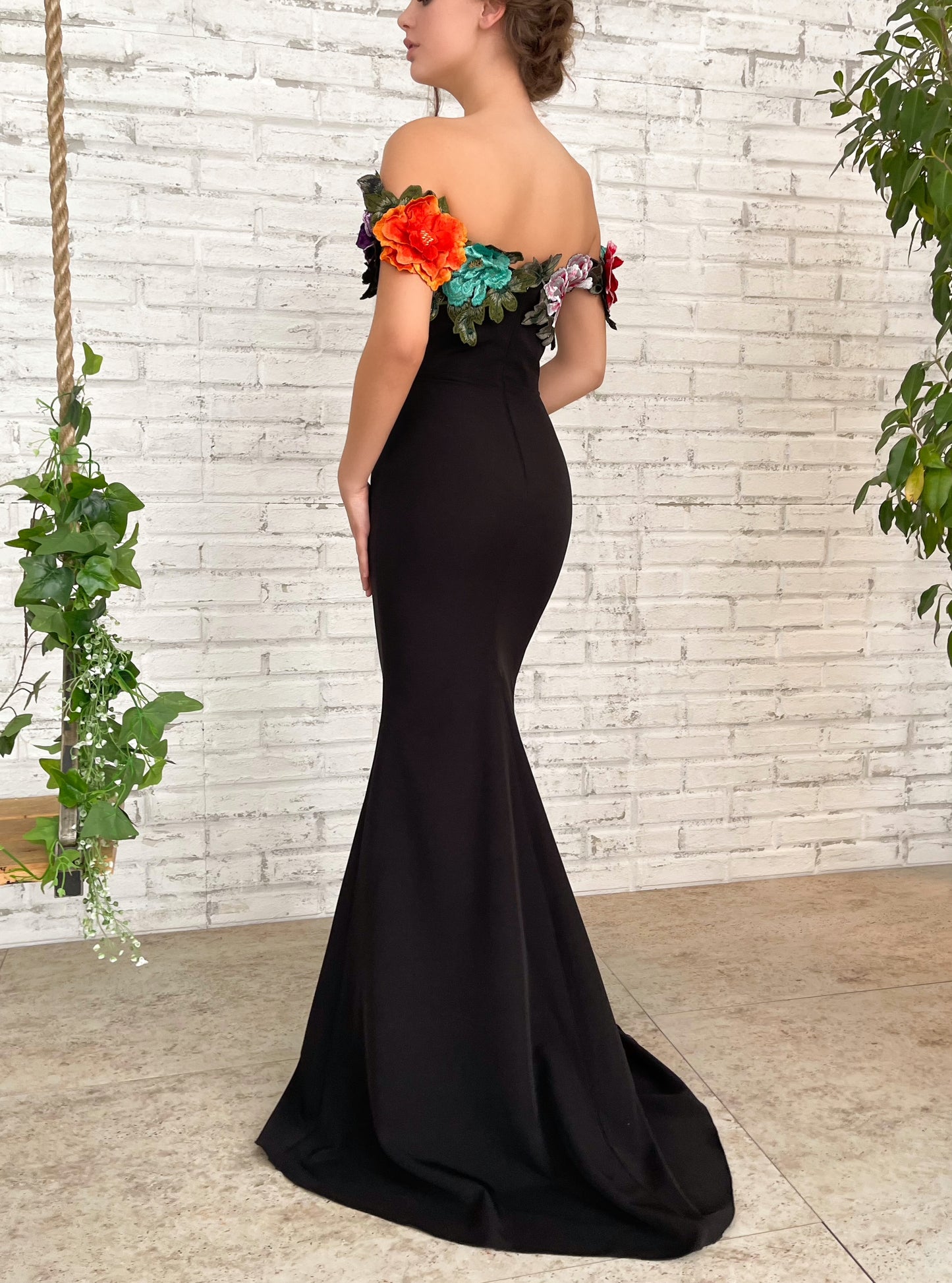 Black mermaid dress with off the shoulder sleeves and embroidery