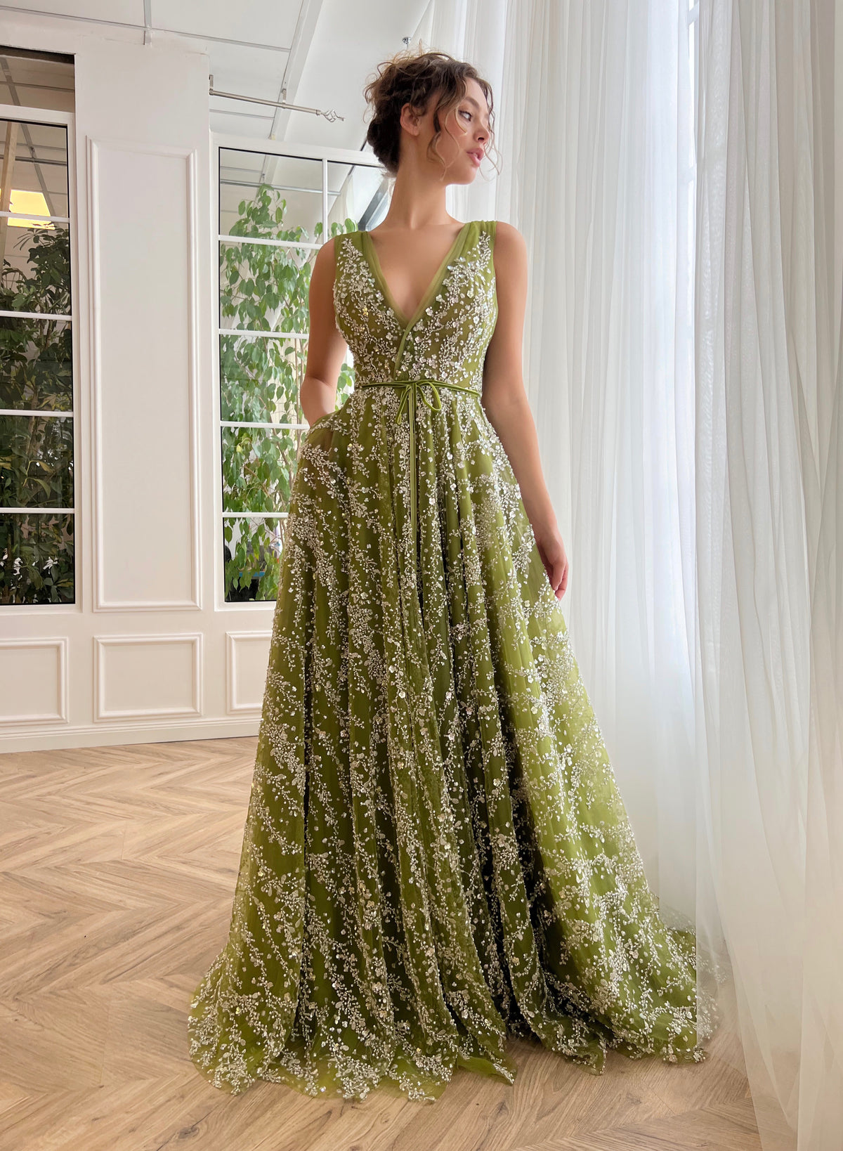 Green A-Line dress with no sleeves and v-neck