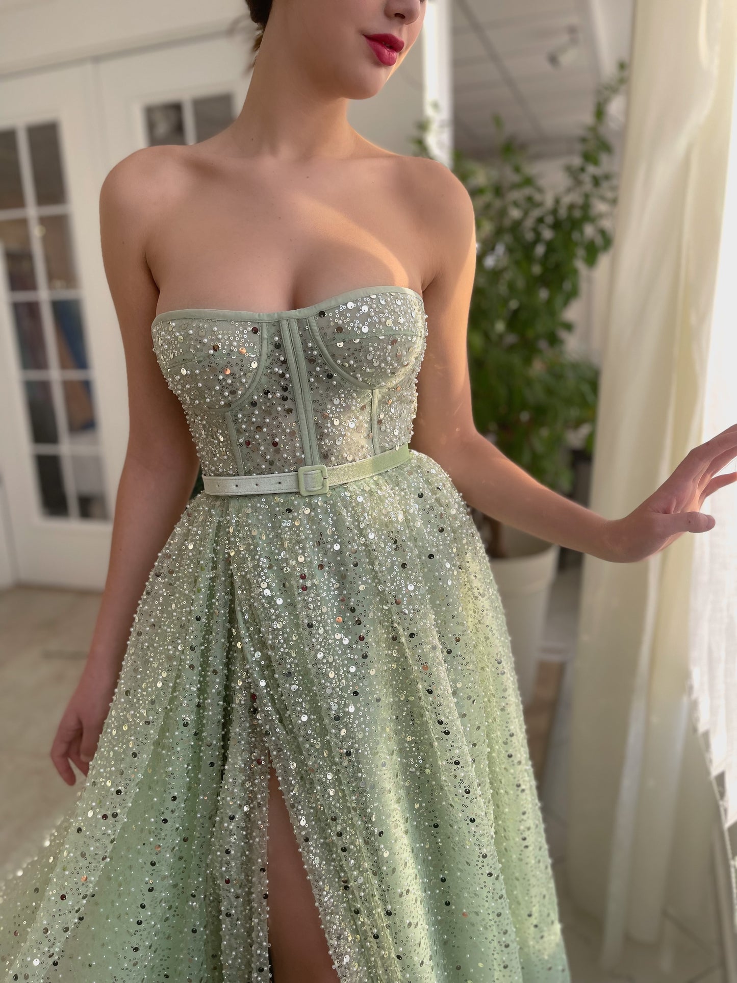 Green A-Line dress with belt and no sleeves