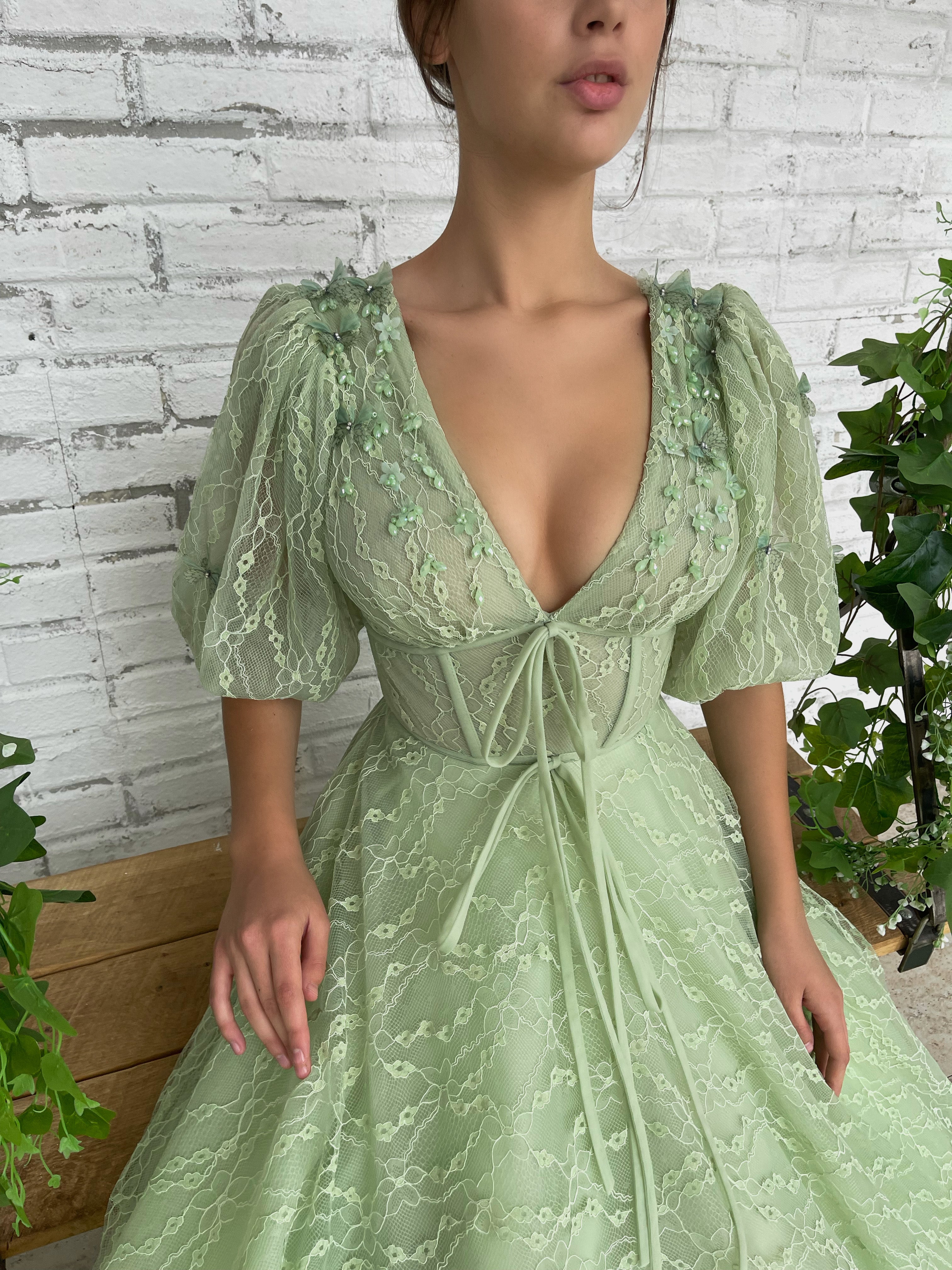 Green A-Line dress with short sleeves, v-neck and embroidery