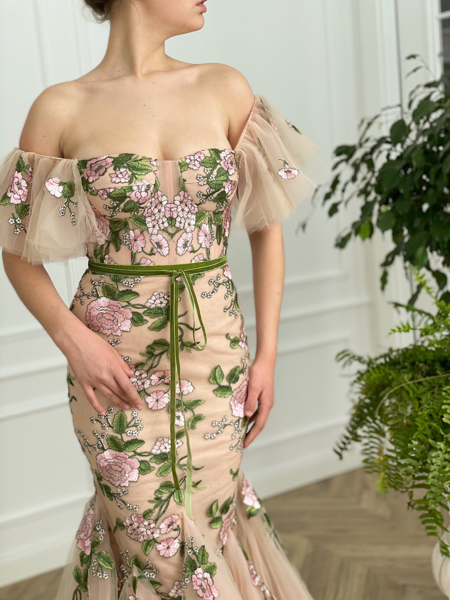 Beige mermaid dress with off the shoulder sleeves and printed flowers