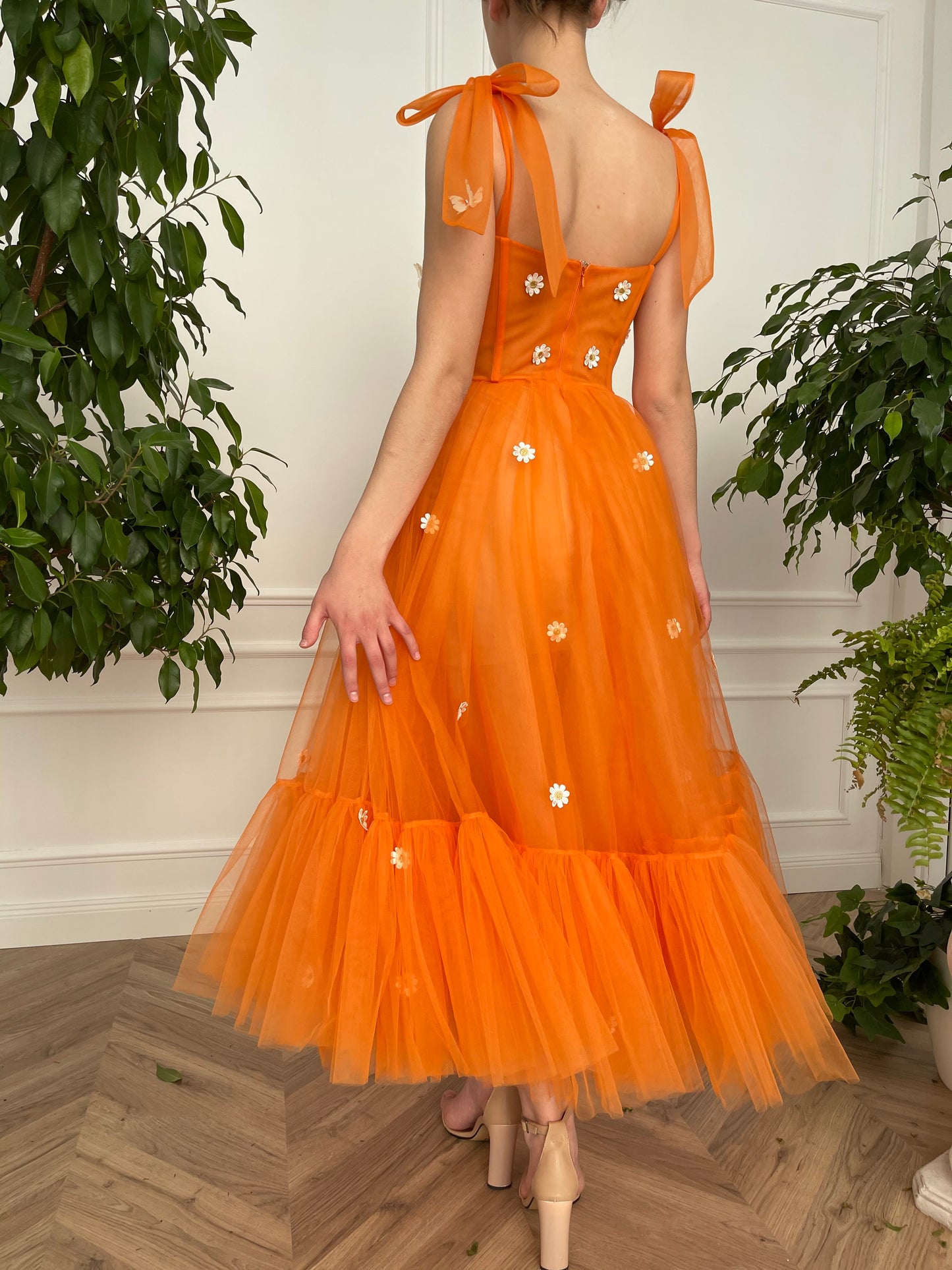 Orange midi dress with bow straps and embroidered daisies and butterflies