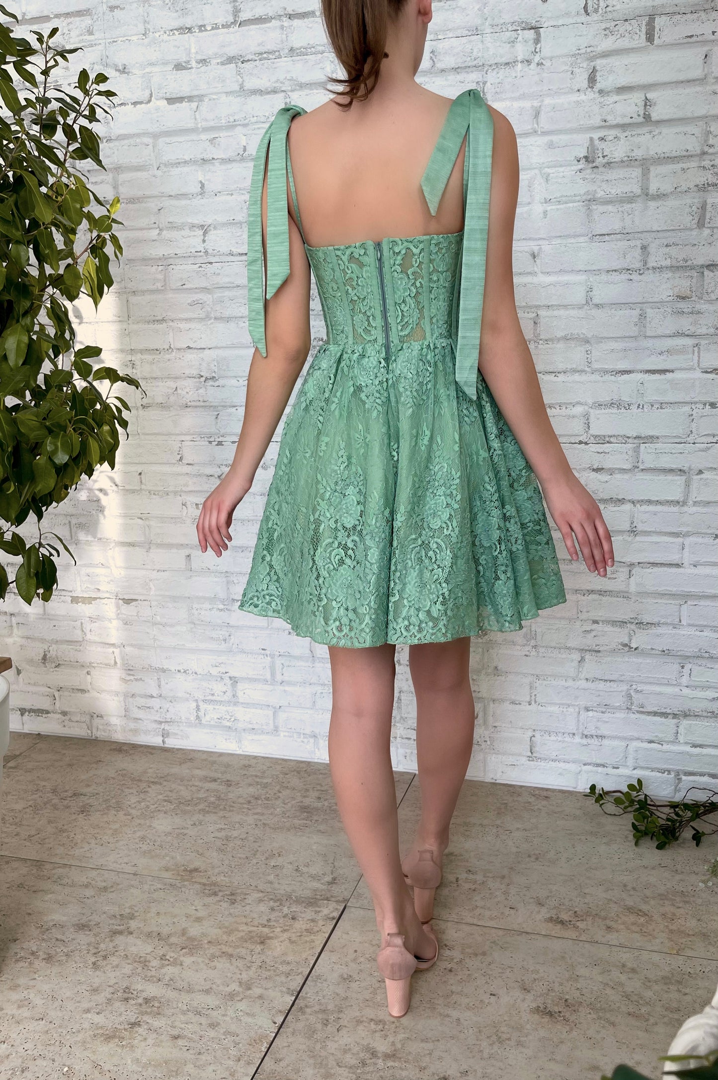 Green mini dress with bow straps