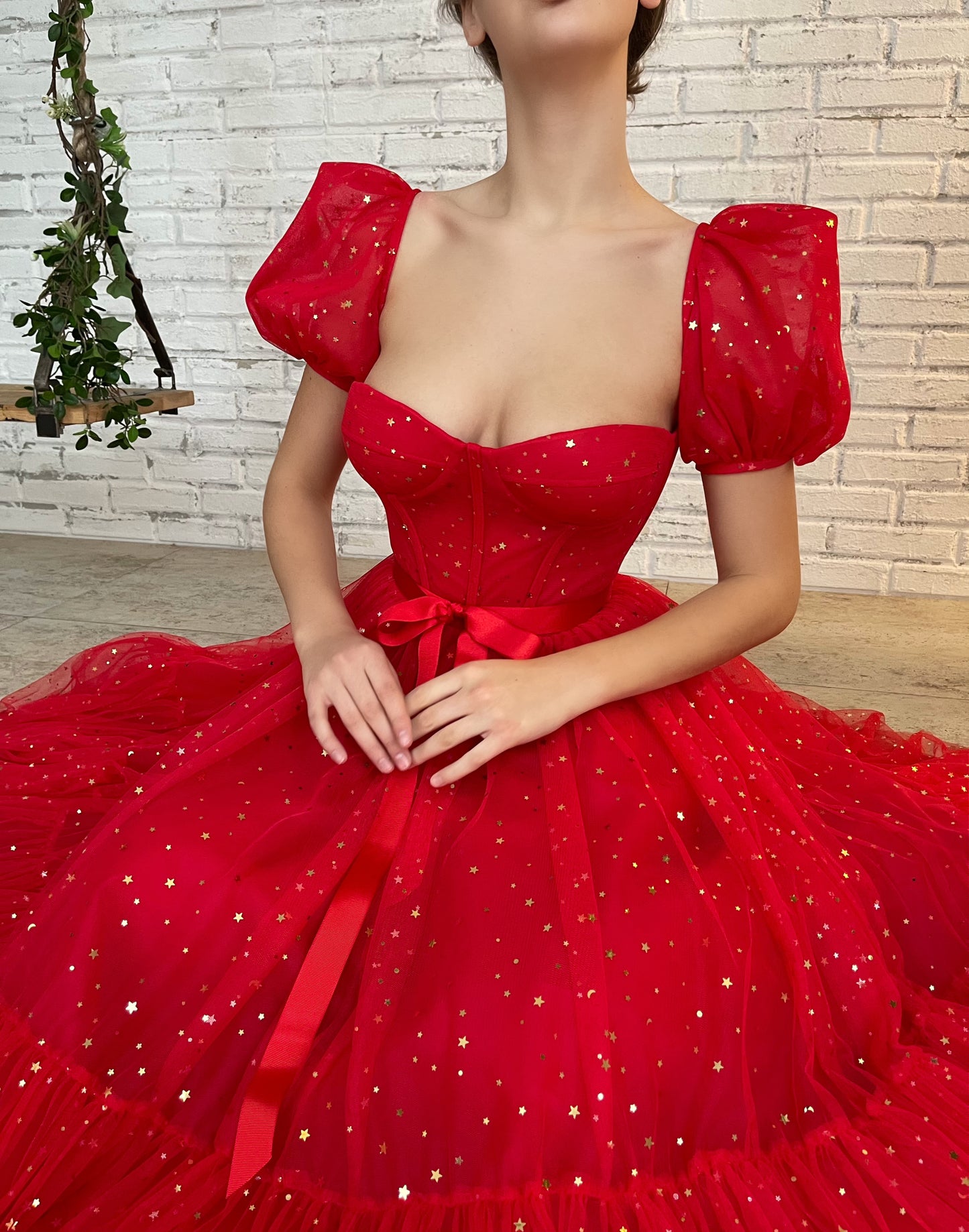 Red midi dress with short sleeves and starry fabric