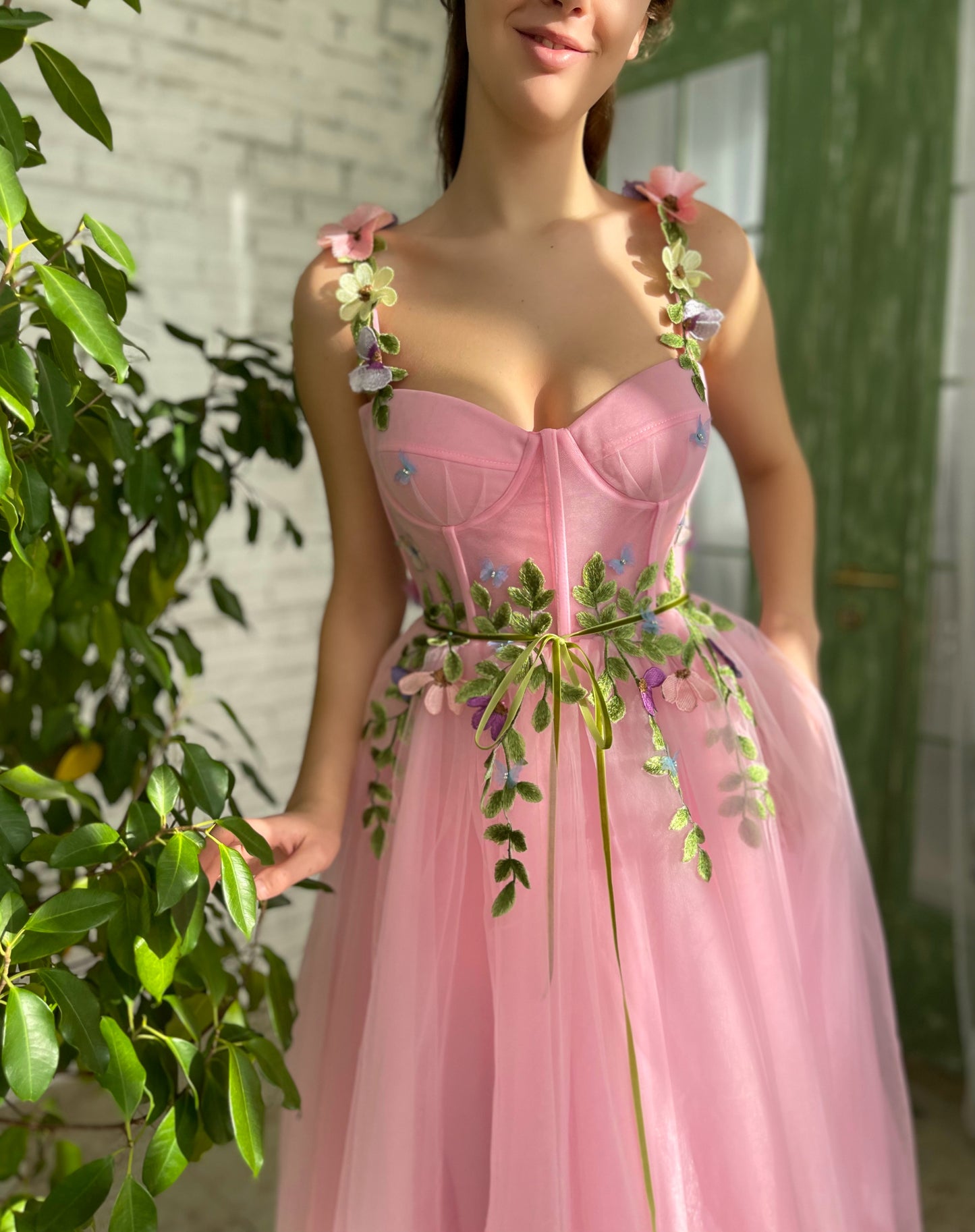 Pink midi dress with spaghetti straps and embroidery