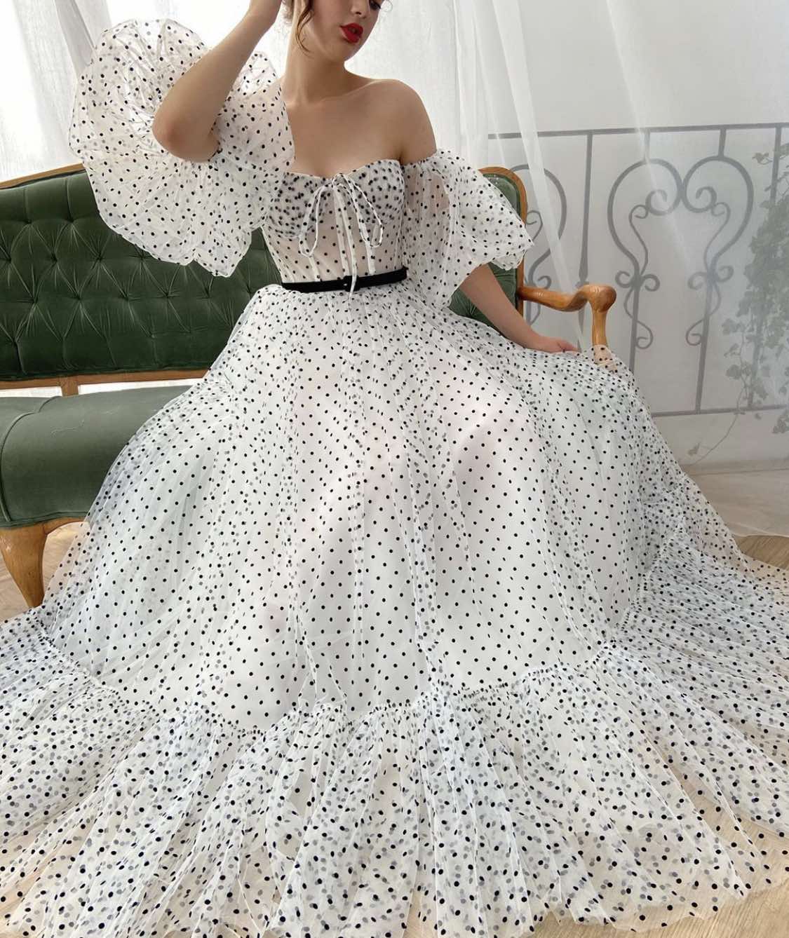 White A-Line dotted dress with off the shoulder sleeves and belt